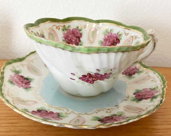 Spectacular Floral and Gold Highlights Teacup and Saucer Set