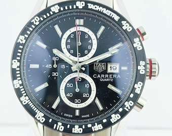 Orologio da polso vintage Tag Heuer Carrera Chronograph con quadrante nero, datario e movimento al quarzo, spedizione gratuita.