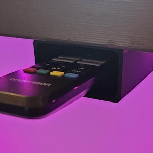 Under Desk Remote Control Holder – Oval Rounded Shape | Adhesive Table Mount | Small (60mm) & Large (75mm)