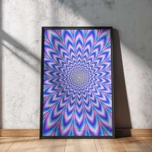 May include: A framed art print with an op-art design. The artwork displays a radial pattern in blue, purple, and white, creating an optical illusion. The black frame enhances the colourful design, making it a striking wall decor piece for any room.