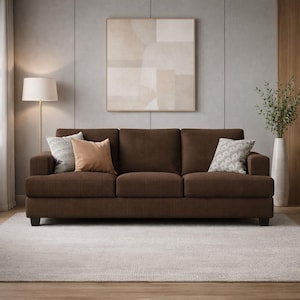 Dark brown corduroy sofa, modern 3-seater couch, cozy textured upholstery, neutral living room styling, contemporary furniture
