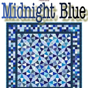 May include: A quilt pattern called "Midnight Blue" by Quilt Addicts in Queensland, Australia. The pattern features a blue and white geometric design with a border of smaller squares.