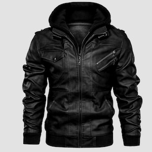 May include: Black leather jacket with a hood. The jacket has a zip-up front, multiple pockets, and ribbed hem and cuffs. The design includes a quilted lining and shoulder accents, offering a classic, rugged look.