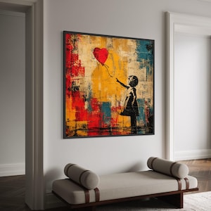 Puede incluir: Impresión artística enmarcada que representa a una niña extendiendo la mano hacia un globo rojo en forma de corazón. La obra de arte tiene un fondo abstracto texturizado con pinceladas rojas, amarillas y azules. La niña y el globo están en silueta.