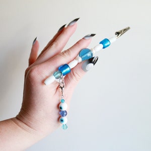 Eye See You Clip - ATM/Debit card clip/bracelet helper/cigarette holder
