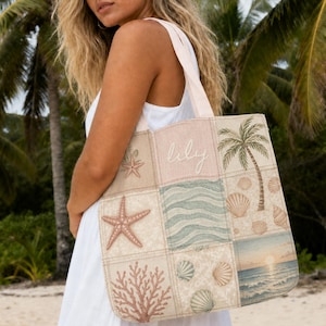 May include: A tote bag featuring a patchwork design of beach-themed illustrations including starfish, seashells, coral, palm trees, and ocean waves. The center panel displays the name lily in cursive script, and one panel shows a sunset over the ocean.