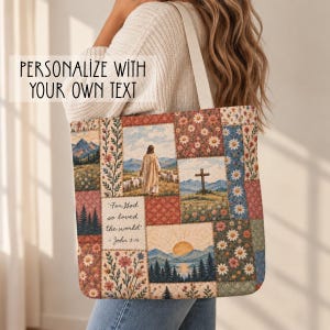 May include: A tote bag featuring a patchwork design with religious imagery, including a figure with sheep, a cross, and mountains. The text reads, "For God so loved the world. John 3:16." The bag has floral patterns and a white strap.