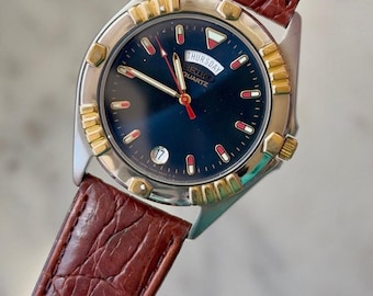Reloj Seiko Quartz bicolor con fecha y día, 1993