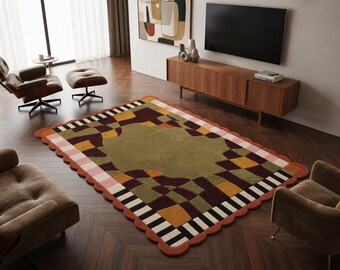 May include: A rectangular area rug with a scalloped edge, featuring a geometric pattern in olive green, mustard yellow, deep burgundy, black, white, and soft pink. The central area is a solid olive green, surrounded by a complex arrangement of blocks, stripes, and curved shapes that create a multi-colored, textured surface design.