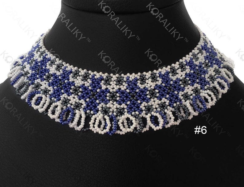 May include: A white, blue, and gray beaded choker necklace with a fringe design. The necklace is on a black mannequin bust. #6