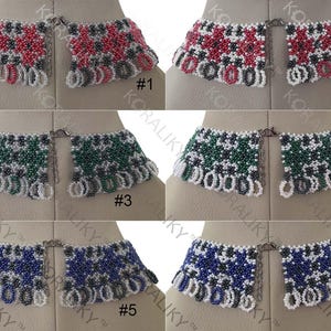 May include: Six beaded necklaces with different colored patterns. Each necklace has a silver clasp and a fringe of white beads. The necklaces are numbered 1 through 6.
