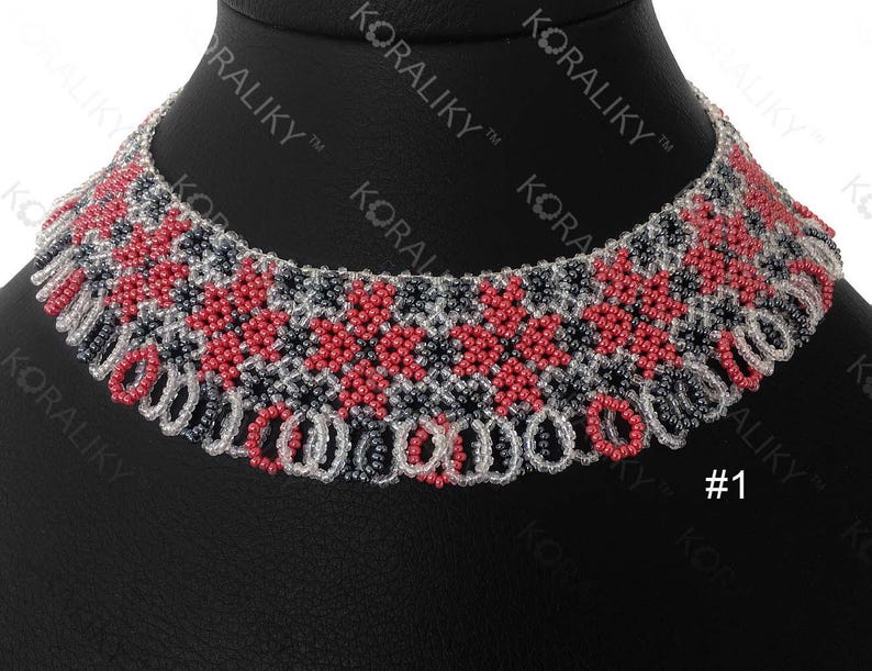 May include: A beaded choker necklace with a geometric pattern in red, black, and white. The necklace is on a black mannequin bust. #1