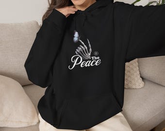 Felpa con cappuccio e stampa grafica "Pace" con teschio e rosa