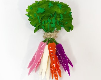 May include: A bunch of carrots with green tops, including a pink carrot, a white carrot, two orange carrots, and a purple carrot.