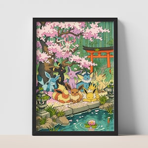 Op de afbeelding: Een ingelijste wandkunstprint met een groep kleurrijke fictieve wezens verzameld in een op Japan geïnspireerde tuin met een rode torii-poort, een stenen lantaarn, een vijver met een lotusbloem en een grote bloeiende kersenbloesemboom.