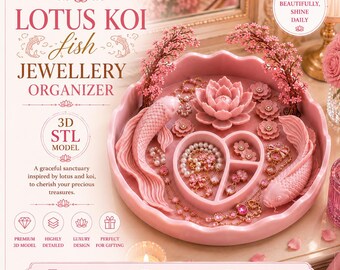 May include: A pink circular jewellery organiser featuring two koi fish, a central lotus flower, and a heart-shaped compartment. The tray is adorned with small floral accents and two decorative pink tree-like structures, holding various pieces of jewellery.