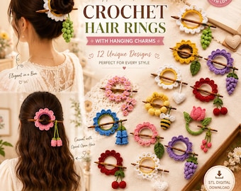 May include: A collection of twelve handmade crochet hair rings featuring various floral and fruit-themed hanging charms, each secured with a wooden stick. The designs include sunflowers, grapes, cherries, bees, and hearts in vibrant yarn colours.