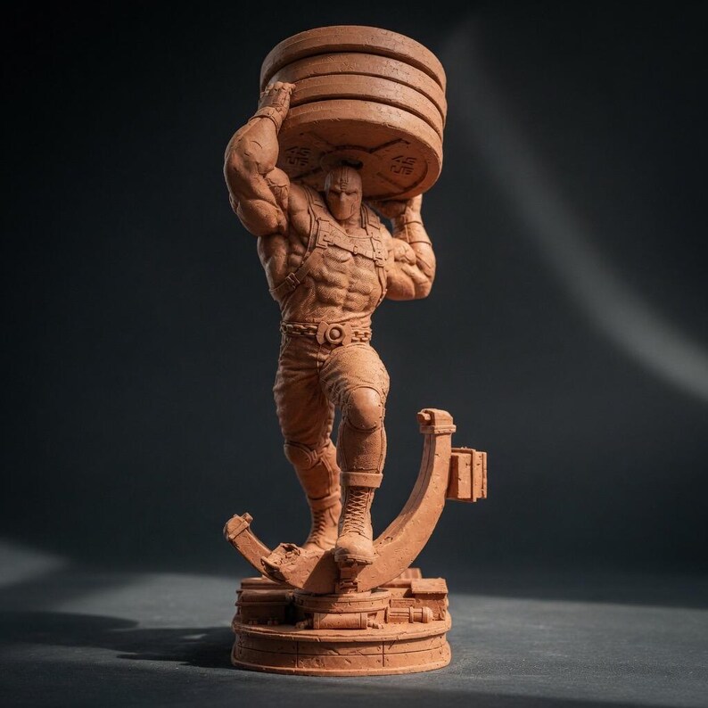 May include: A terracotta-colored figurine of a muscular figure lifting a stack of weight plates. The figure is wearing a harness and pants, and is standing on a circular base with a stylized support structure. The weight plates have the text "45 LBS" on them.