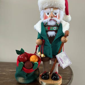 May include: A set of three ceramic mugs with a speckled, matte finish. The mugs are in shades of cream, light gray, and dark gray. Each mug has a simple, minimalist design, perfect for coffee or tea.