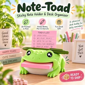 Pode incluir: Um organizador de secretária em forma de sapo verde-claro com barriga branca, com uma ranhura para um bloco de notas autocolantes cor-de-rosa e um sulco horizontal para uma caneta. Na boca, há uma nota cor-de-rosa com o texto TOAD-O LIST, CATCH FLIES, BUY FLIES (BULK!), WATER THE LILY PAD, RENEW POND MEMBERSHIP e PRACTICE RIBBIT.