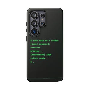 May include: A black smartphone case featuring a green terminal command line interface print that reads: $ sudo make me a coffee, [sudo] password: ********, brewing..., [##########] 100%, coffee ready., $ _. The case has a multi-lens camera cutout.