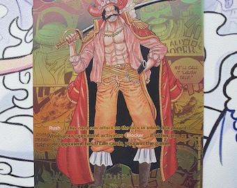 Puede incluir: Una tarjeta coleccionable con un personaje con abrigo rojo, camisa rosa y pantalones naranjas, sosteniendo una espada. La tarjeta tiene un fondo dorado con el número 10 y el texto "GOLD.ROGER" y "King of the Pirates".