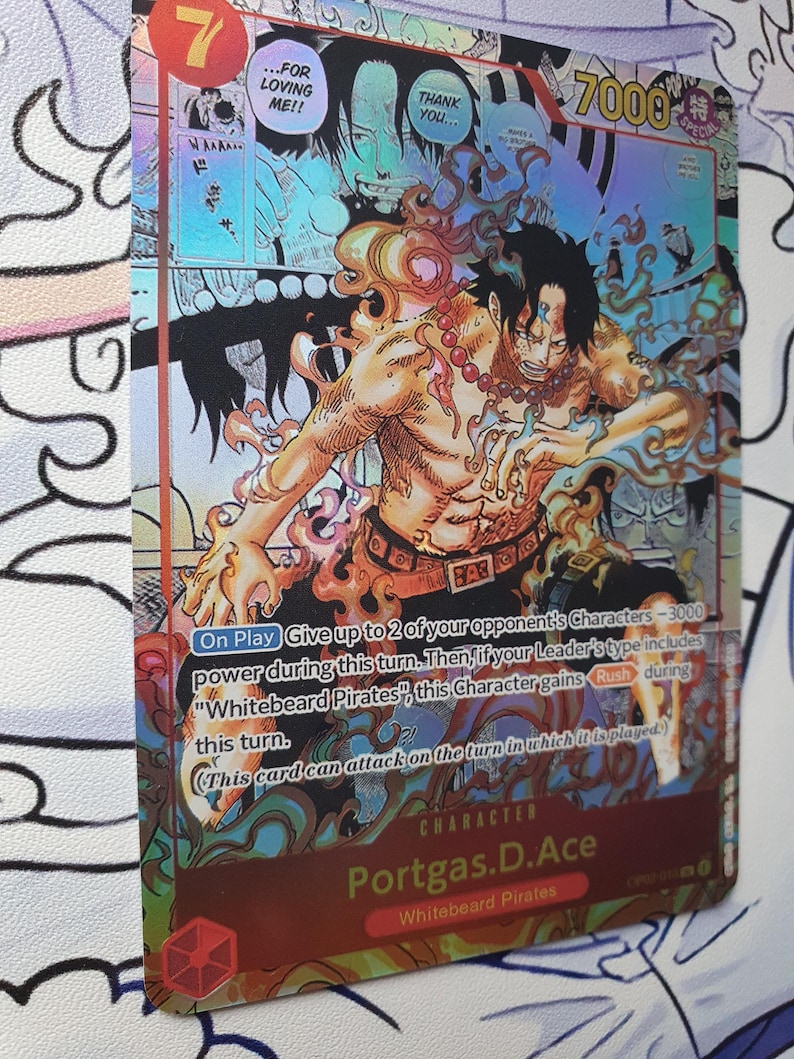 May include: A holographic trading card featuring the character Portgas D. Ace from the "Whitebeard Pirates" series. The card has a vibrant design with a fiery theme, a character illustration, and game text. The card has a 7000 power level.
