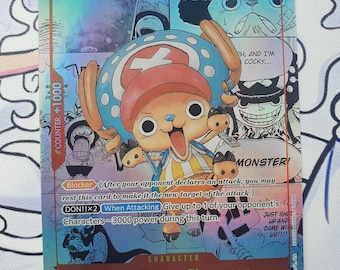 Puede incluir: Una tarjeta coleccionable holográfica con Tony Tony. Chopper del anime One Piece. La tarjeta tiene un diseño colorido con una imagen de dibujos animados de Chopper, un reno, y texto que incluye "Monster!" y "When Attacking".
