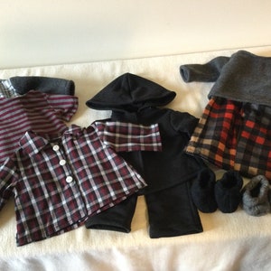 18 inch boy doll, mix and match clothes in black and burgandy. Pick from eight different items in black, grey and burgandy