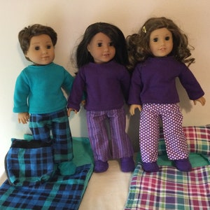 Pajamas or Sleeping bag sets to fit 18 inch dolls, Sleeping bag sets, pjs sets and backpacks, in teals, navy and purple prints.