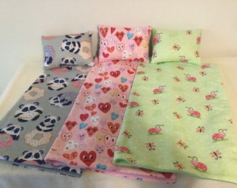 Baby doll blanket and pillow sets. Choice of three prints. Covers AG Bitty babies or baby dolls,  in most beds or cradles.