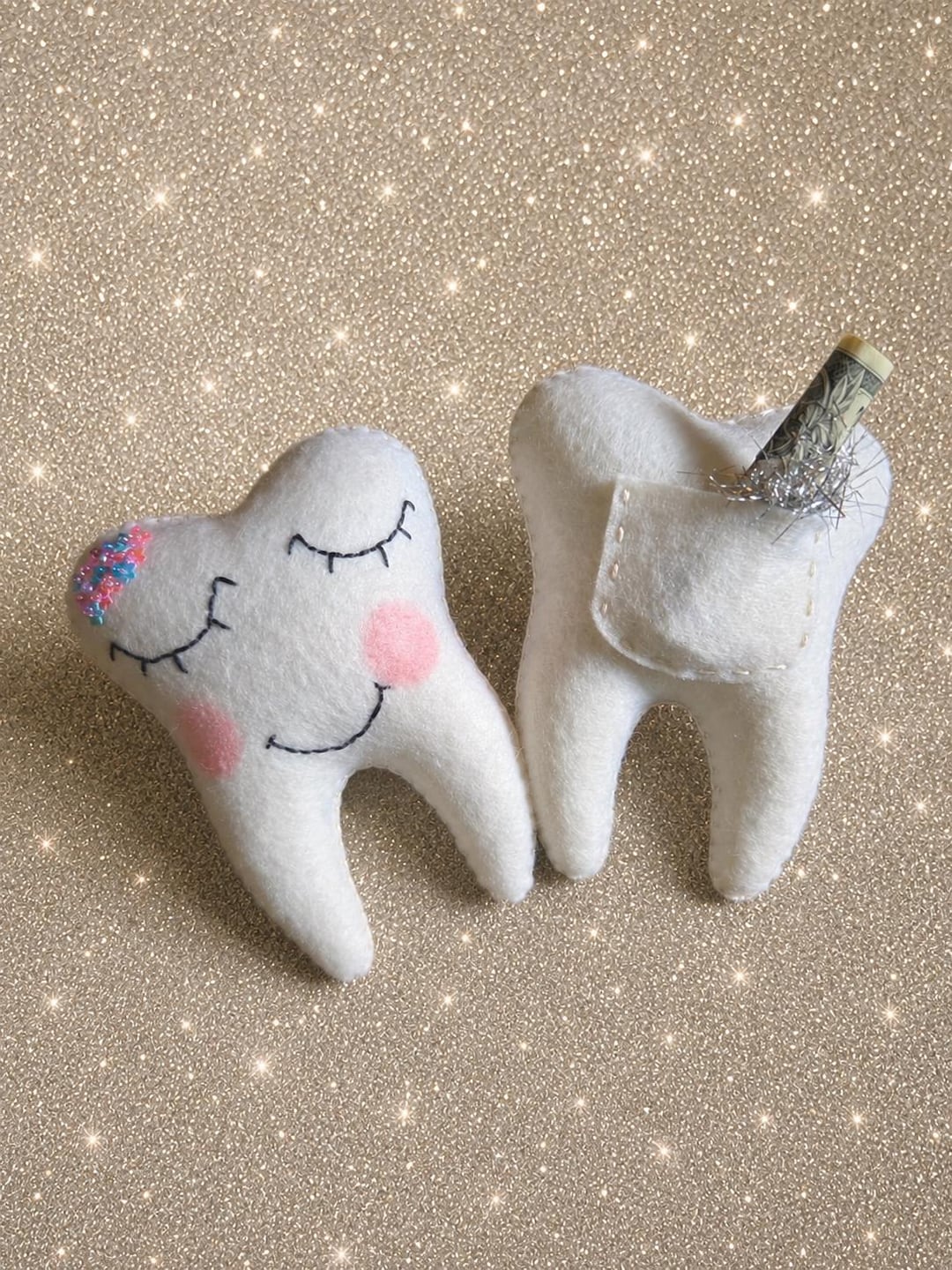 White felt tooth fairy pillow with pocket