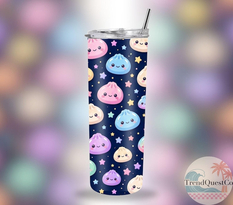 May include: A stainless steel tumbler with a navy blue background, patterned with smiling dumplings and stars in pastel colours. It has a silver lid and a silver straw.
