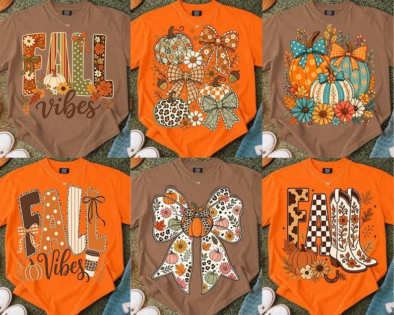 May include: A collection of six short-sleeved t-shirts in brown and orange, featuring various graphic prints including pumpkins, bows, flowers, cowboy boots, and the text FALL VIBES, displayed in a grid layout on a textured surface.