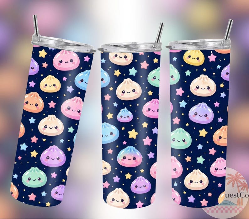 May include: Three stainless steel tumblers with a navy blue background, patterned with smiling dumplings and stars in various colours. Each tumbler has a silver lid and a straw.