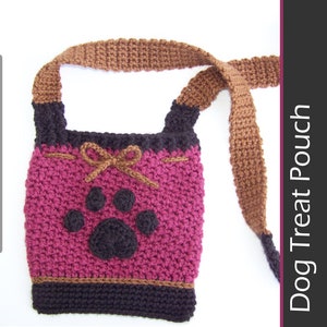 May include: Crocheted dog treat pouch in shades of pink, brown, and black. The pouch features a paw print design and a brown strap for carrying. The text "Dog Treat Pouch" and "Crochet Pattern PDF" are visible.