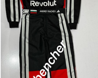 Traje de carreras F1 Go Karting F1 2026 de nuevo diseño. Añade logotipos, diseños, nombre y bandera personalizados. Traje personalizable con pasamontañas gratis.