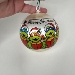 Adorno navideño de las Tortugas Ninja de 1990, International Silver Co., bola de tortuga con caparazón de capiz de 7,6 cm (3 pulgadas)