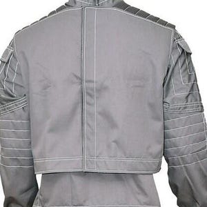 May include: A grey jacket featuring a high collar and long sleeves with horizontal white stitching details. The back panel has a central vertical seam, and the shoulders and sleeves include structured quilted sections with white topstitching.