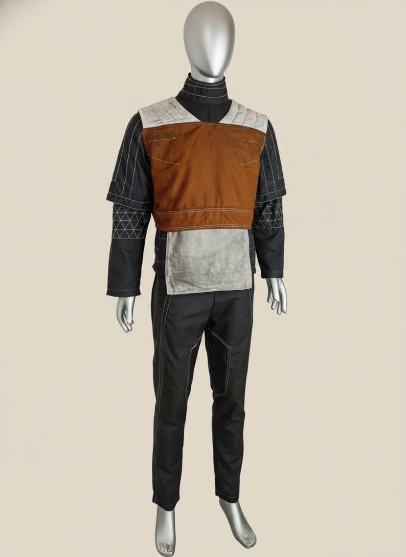 May include: A set of three ceramic mugs with a speckled, matte finish in cream, light grey, and dark grey. Each mug has a simple, minimalist design, ideal for coffee or tea.