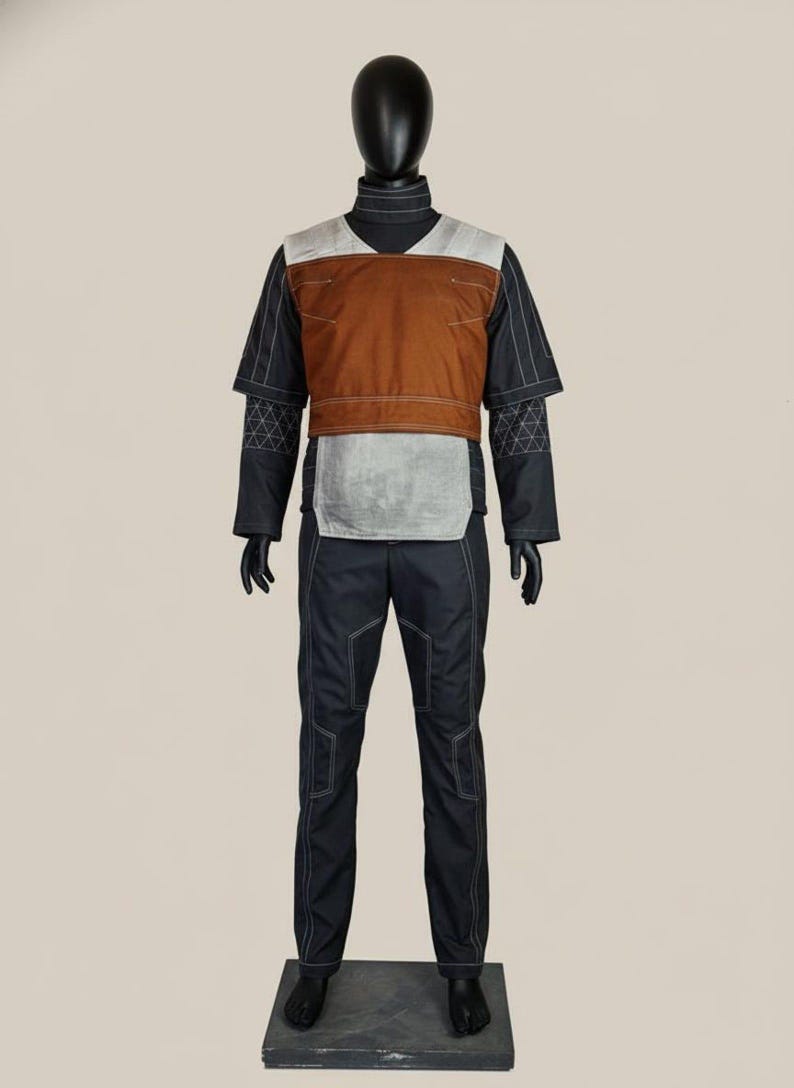 May include: A full outfit displayed on a mannequin. The outfit comprises a black turtleneck, a brown and grey vest, black trousers, and black gloves. White stitching highlights the seams. The mannequin stands on a grey base.