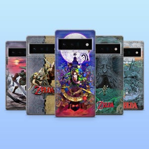 May include: A collection of five phone cases featuring artwork from the Legend of Zelda video game series. Each case displays a different scene with vibrant colors and detailed illustrations, including characters and landscapes from the game.