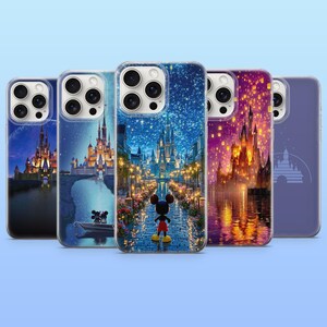 May include: Five clear phone cases with Disney castle designs. Each case features a different nighttime scene with castles, water reflections, and Mickey Mouse. The cases have a glossy finish and are set against a light blue background.