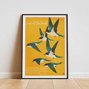 May include: Framed art print showing swallows in flight against a yellow backdrop. The birds are illustrated with blue, white, and red details. The text "Look at the birds" is at the top of the print.