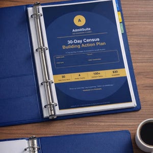 May include: A blue binder open to a printed document titled "30-Day Census Building Action Plan" by AdmitSuite. The document has a navy blue and yellow color scheme with text and a logo. A pen and a calculator are visible.