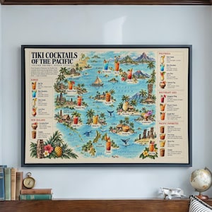May include: A framed wall art print titled Tiki Cocktails of the Pacific, featuring a detailed map of the Pacific Ocean illustrated with various colourful tropical cocktail drinks, island landmarks, and descriptive text lists.