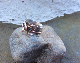 Spinner ring,  Sterling silver and copper bow spinner ring