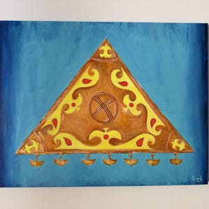 May include: A painting on a blue background featuring a large, brown triangular object decorated with yellow and red swirling patterns. A circular emblem is centered on the triangle, and seven small, metallic-colored pendants hang from the bottom edge.