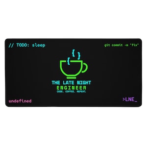 May include: Black rectangular mousepad with the text "// TODO: sleep" and "git commit -m "fix"" in teal. A green coffee cup graphic with curly braces is centered, with "THE LATE NIGHT ENGINEER" and "CODE. COFFEE. REPEAT." below it.