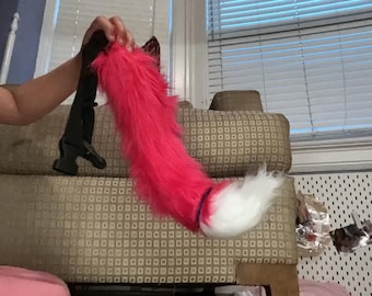 Cola de disfraz de piel rosa